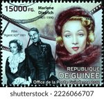 Small photo of Milan, Italy - September 22, 2022: Marlene Dietrich on postage stamp of Guinea