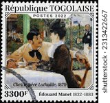 Small photo of Milan, Italy – May 14, 2023: Portrait of lovers by Edouard Manet on postage stamp