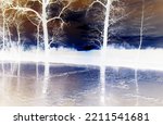 Inverted colors - Pond with partially frozen water surface illuminated by beautiful dusk behind bare trees and dark horizon in snowless winter.