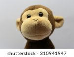 Cute Monkey Toy Shot On White 