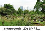 Small photo of Central Jakarta, Indonesia - Oct, 21, 2021: The TPU Karet Bivak Cemetery with an area of: 16.2 hectares (0.16 km2; 0.06 sq mi) is located in Central Jakarta.