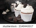 Chocolate cupcake with cream and Oreo cookies