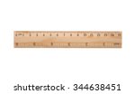 Wooden ruler including clipping ...