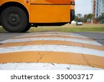 The speed bumps on the road and the bus