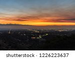 Los Angeles, California, USA - November 10, 2018:  Smoke filled dawn sky above the San Fernando Valley.  Smoke is from the Woolsey fire in Malibu and Ventura County.  