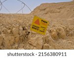 Small photo of Arava Desert Israel 11.05.2022 Sign Danger Mines in Arava desert