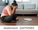 Small photo of Stressful Asian overweight woman sad of dieting Weight loss fail.