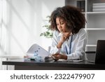 Small photo of African American Business woman hard working, debtor, deferred debt, Times Interest Earned, Subsidiary Ledger, Special Journal, Shareholders Equity, Scrap value, Price Index, Profitability Ratios
