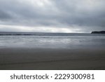 A Photo Of An Empty Beach On A...