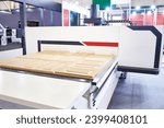 Small photo of CNC workingcenter woodworking with milling, optimization, drilling in 2D and 3D processes of panels such as wood, fiberboard, chipboard, doors, furniture