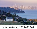 Small photo of Dusk over St Hillary's Church, Angle Island, Alcatraz Prison, San Francisco Bay and San Francisco Skyline. Tiburon, Marin County, California, USA.