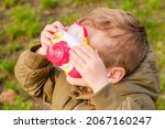 portrait of child boy taking... | Shutterstock . vector #2067160247