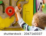 cute little boy playing with... | Shutterstock . vector #2067160337