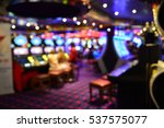 Blurred image of slots machines at the Casino