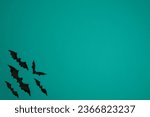 Turquoise background with bats...