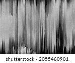 Analog glitch texture. Distressed overlay. Old videotape damage. TV signal error. Dark black white bw grain line noise abstract background.