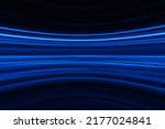 Blur glowing lines. Neon abstract background. Futuristic radiance. Defocused luminous navy blue color curve streak light flare motion on dark black.