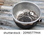 Small photo of a cooking pot that has been used too often which causes the inside and outside to be scorched and blackened