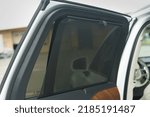 Small photo of St Petersburg, Russia - August 01, 2022: Volvo XC90 II Restyling sun protect sunblind