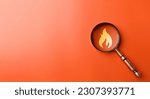 Small photo of Fire surveillance inspection and fire fighting with magnifying glass on orange background. Fireman and conflagration concept.