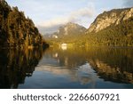 gorgeous alpine lake Alpsee in the Bavarian Alps on a sunny September day in Schwangau, Allgau, Bavaria, Germany	
                               