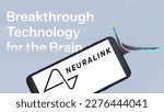 Small photo of Jakarta - March 18,2023: Neuralink Corporation logo with their slogan in the background. Neuralink is an American neurotechnology company that develops implantable brain–computer interfaces (BCIs)