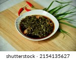 Small photo of Tunisian Madfouna - Madfouna is a speciality of the people of the Tunisian capital and consists mainly of herbs, beef, chard, beans and some spices