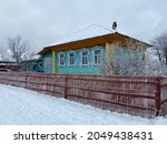 Snow Covered Village House In...