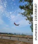 Small photo of BARCELONA, SPAIN - 23th of July 2022: Iberia airplane landing in Barcelona- El Prat Airport. Iberia is a spanish airline. Views from "El Delta del Llobregat"