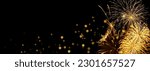 Small photo of Elegant gold and black background with fireworks and light sparkles. Background for birthday celebrations, big events, congratulations and holidays like 4th of July or New Year's Eve
