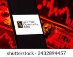 Small photo of New York Community Bank logo is seen on an smartphone over over stock chart and dollars, New York Community Bank logo is displayed on the screen of a mobile device, United States, March 3, 2024