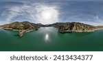 Small photo of 360 view. VR pano. Reservoir between mountains. Panoramic aerial view over the water of dam and dammed water between mountains. Water reservoir with colorful water color. Andalusia. Spain.