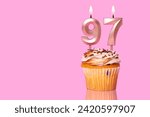 Small photo of Birthday Cake With Candle Number 97 - On Pink Background.