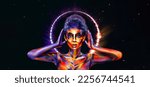 Small photo of Girl in a glowing neon circle. Woman in color body painting on her face. Cover art for your mixtape, video, song or podcast. Design for book covers.
