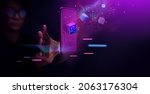 Small photo of Metaverse and Blockchain Technology Concepts. Person with an Experiences of Metaverse Virtual World via Smart Phone. Futuristic Tone. Conceptual Photo