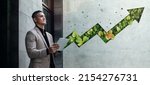 Small photo of ESG Concepts. Environmental, Social and Corporate Governance. Businessman Working on Tablet. Sustainable Resources. Environmental and Business Growth Together. Blurred Green Leaf Arrow as background
