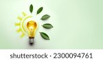 Small photo of Green Energy Concepts. Wireless Light Bulb surrounded by Green Leaf form as Sign of Lights On. Carbon Neutral and Emission ,ESG for Clean Energy. Sustainable Resources, Renewable and Environmental