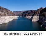 Small photo of BOULDER CITY, NV - OCTOBER 4: The bath tub rings marking lowering water levels in Lake Mead due to the drought are seen from the Hoover Dam in Boulder City, Nev., on October 4, 2022.