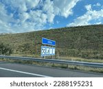 French highway with road sign indicating rest area.