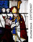 Small photo of St Peter church. Saint Fiacre, Catholic priest, abbot, hermit, and gardener of the seventh century. Stained glass window. Dreux. France. 05-31-2019