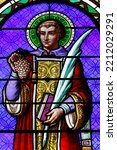 Small photo of Stained glass window. St. Vincent of Saragossa . Patron of winegrowers. Saint Germain les Arlay. France. 07-26-2020