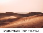 Sharjah desert sand dunes at sunset