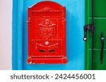 Small photo of Envelopes with letter and mail box.mail box background,Mail Box in Front of a House , Post in the door mailbox,Mail Communication Connection message , email marketing concept, person reading e-mail