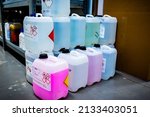 Small photo of Plastic barrels containing toxic chemicals, waste management concept, industrial background