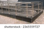 Small photo of Handrails for the ramp for the disabled. Manufacturing and installation of ramps. Improvement of buildings for the elderly. The ramp and handrails are made of stainless steel. Entrance to buildings.