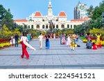 Small photo of Ho Chi Minh City, Vietnam - January 30th, 2022: Walking street morning Lunar New Year at downtown before city People's Committee attract many tourists to visit, in Ho Chi Minh City, Vietnam