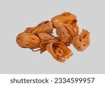 Small photo of Heap of Mace spice on isolated on white background