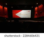 Small photo of Mumbai, India - 03 Feb 2023 : Intermission screen in movie theatre. People sit in theatrical chairs and wait for the movie to start.