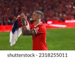 Small photo of Lisbon, Portugal - 05 27 2023: Liga Bwin game between SL Benfica and CD Santa Clara and celebrations after winning championship; Mihailo Ristic celebrates after winning 38th Championship with Benfica