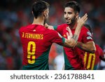 Small photo of Faro, Portugal - 09 11 2023: UEFA Euro 2024 qualifying game between Portugal and Luxembourg in Estadio Algarve; Bruno Fernandes and Goncalo Inacio celebrate after goal